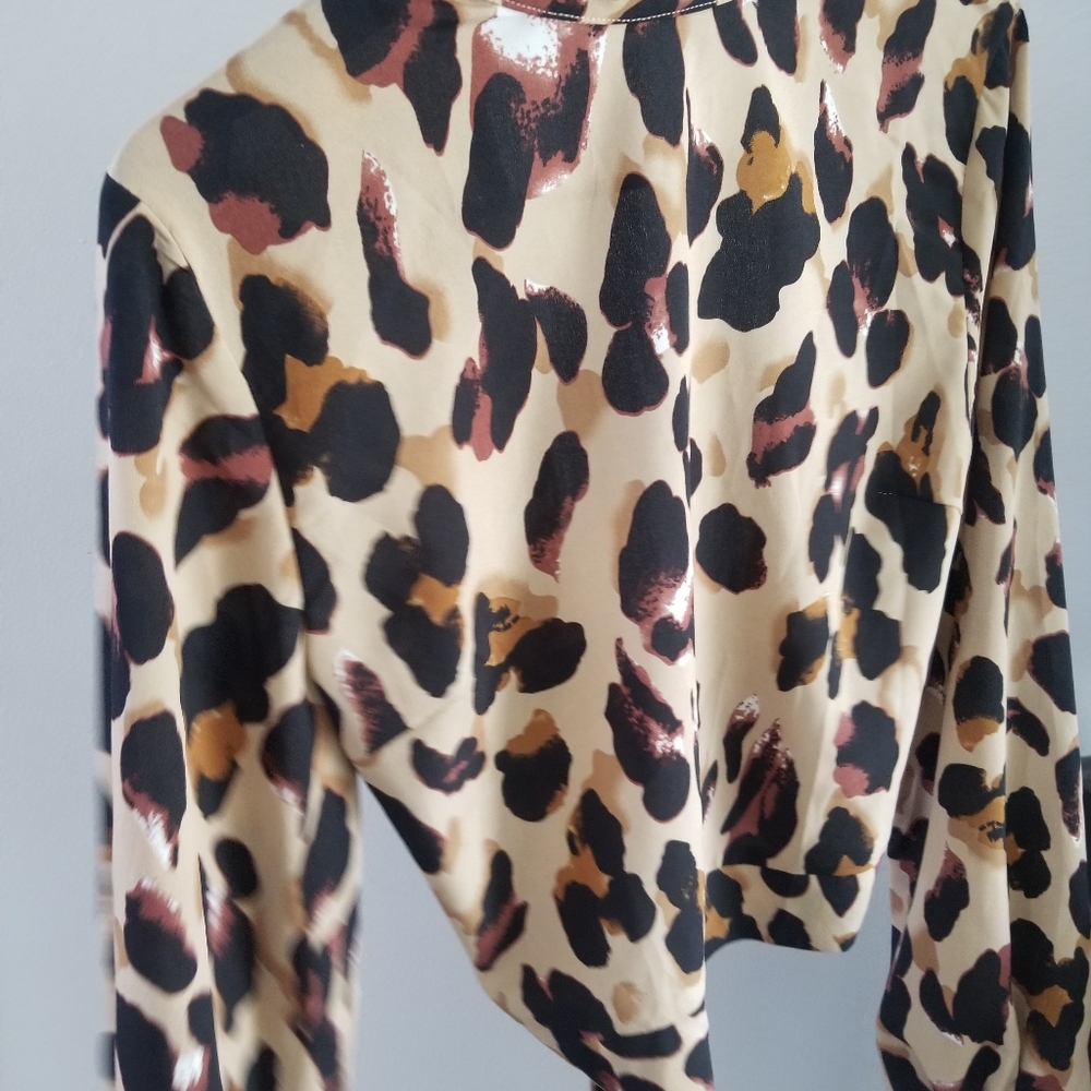 Leopard print open back blouse